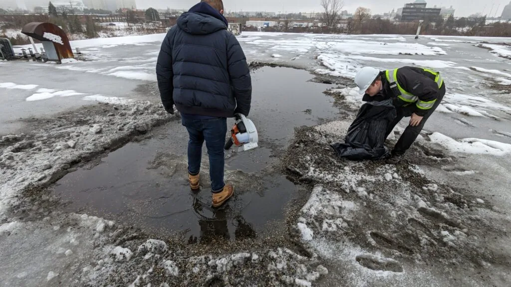 Ponding-water inspection on a commercial flat roof