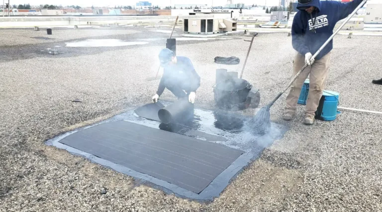 Delta Roofing technician performing an emergency roof repair